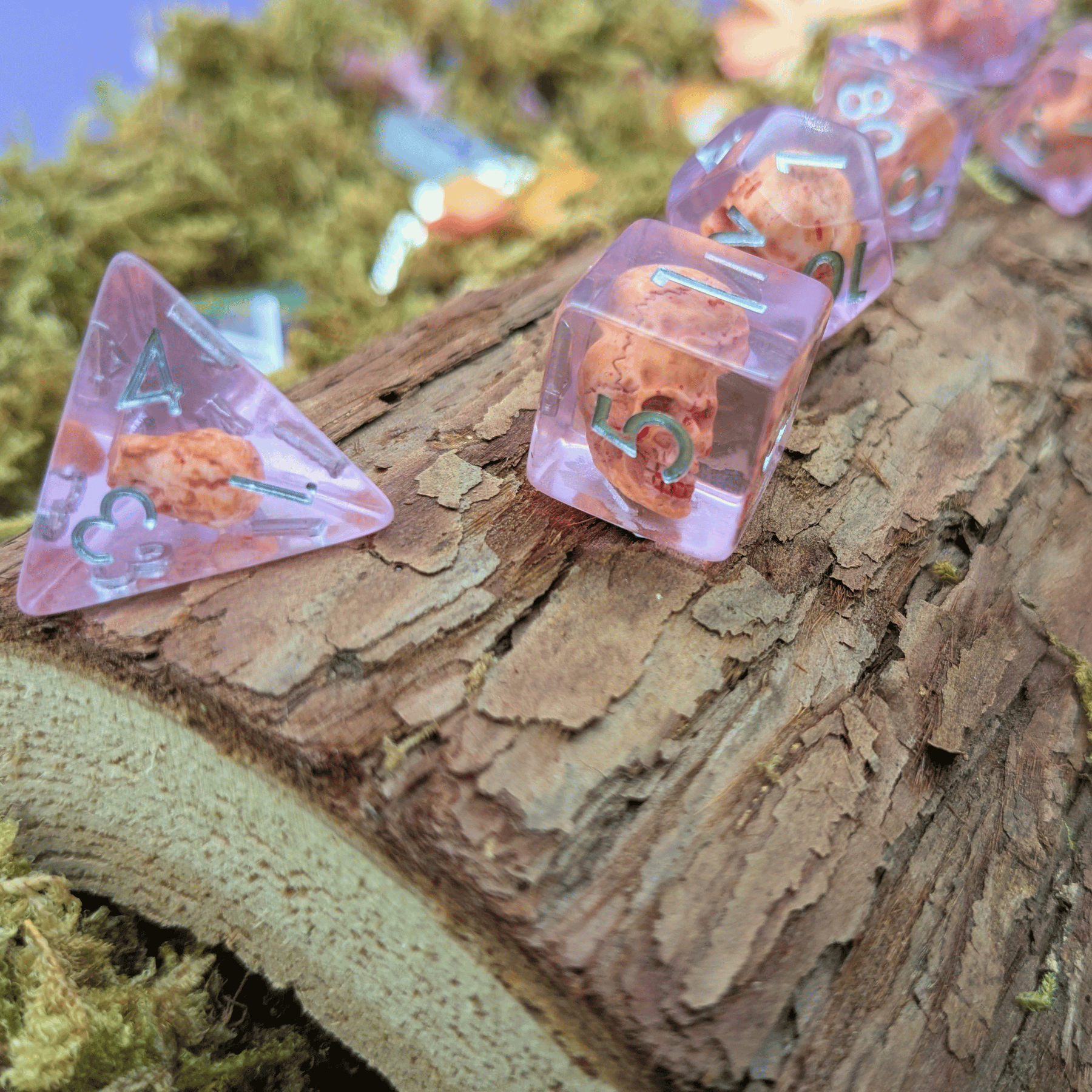 Pink Skull Inclusion Dice Set