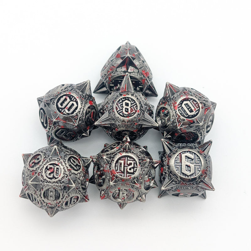 The Executioner’s Throw | Caltrops Splatter Metal Dice