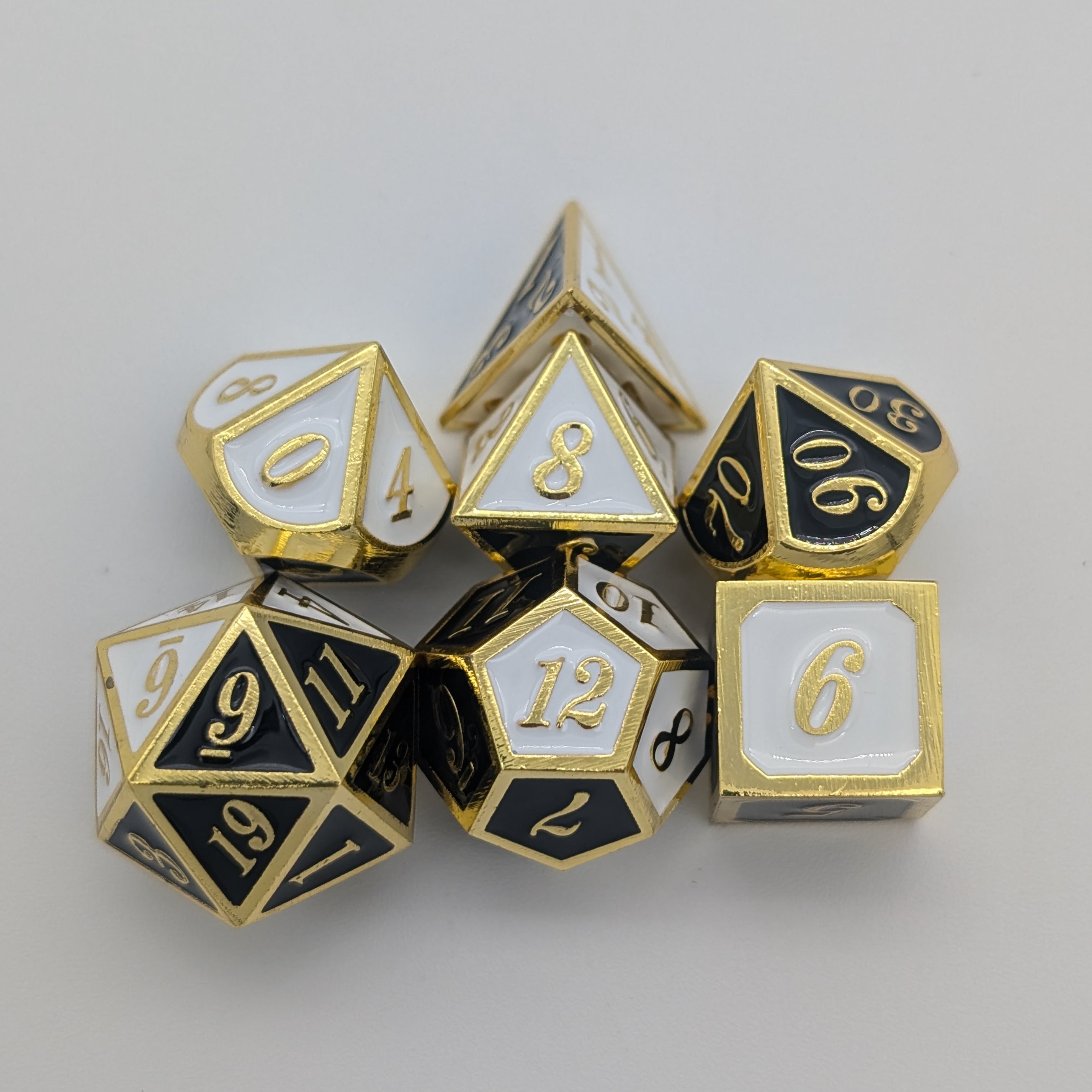 Dual Tone Black White and Gold Metal Core Dice Set