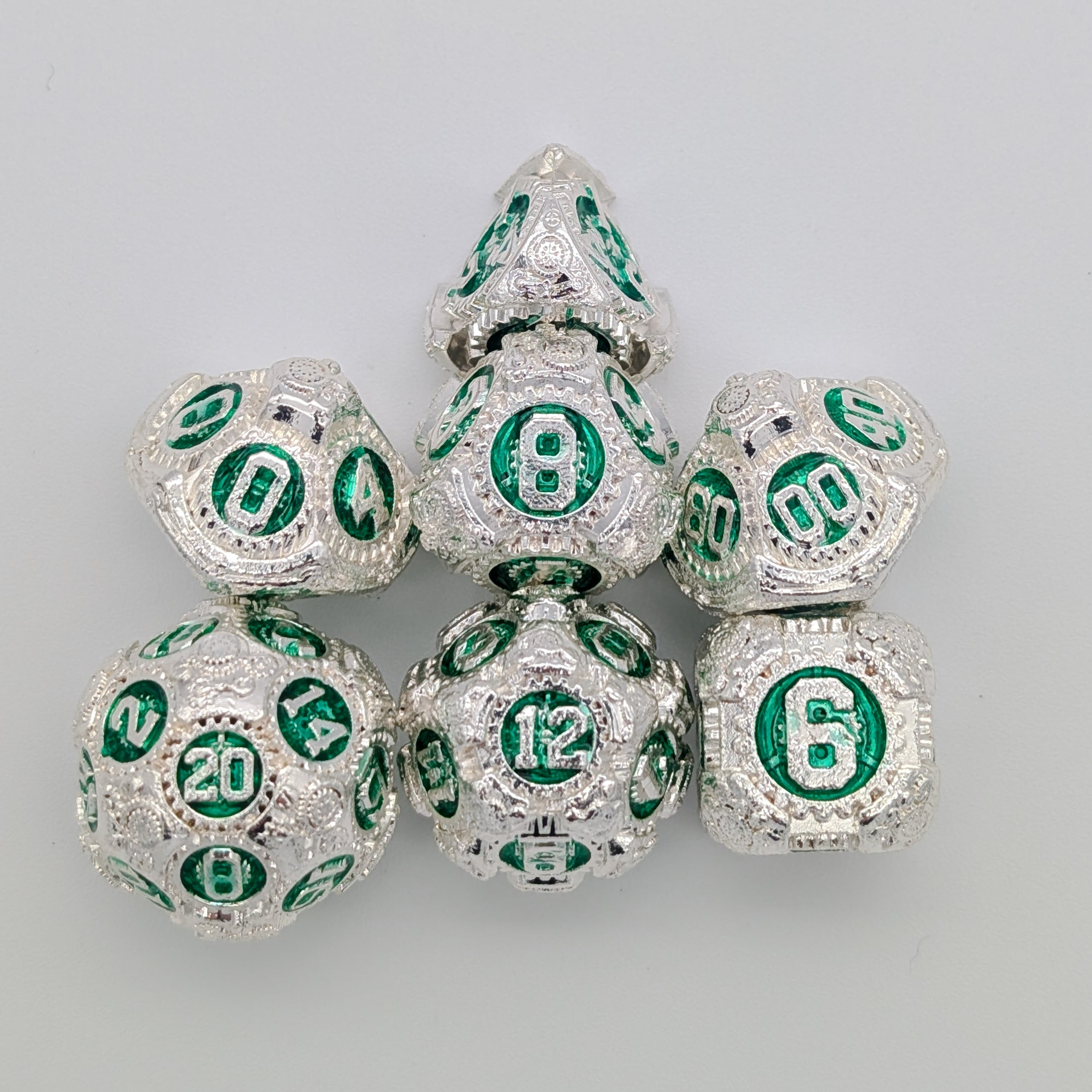 Gears Silver and Green Metal Core Dice Set