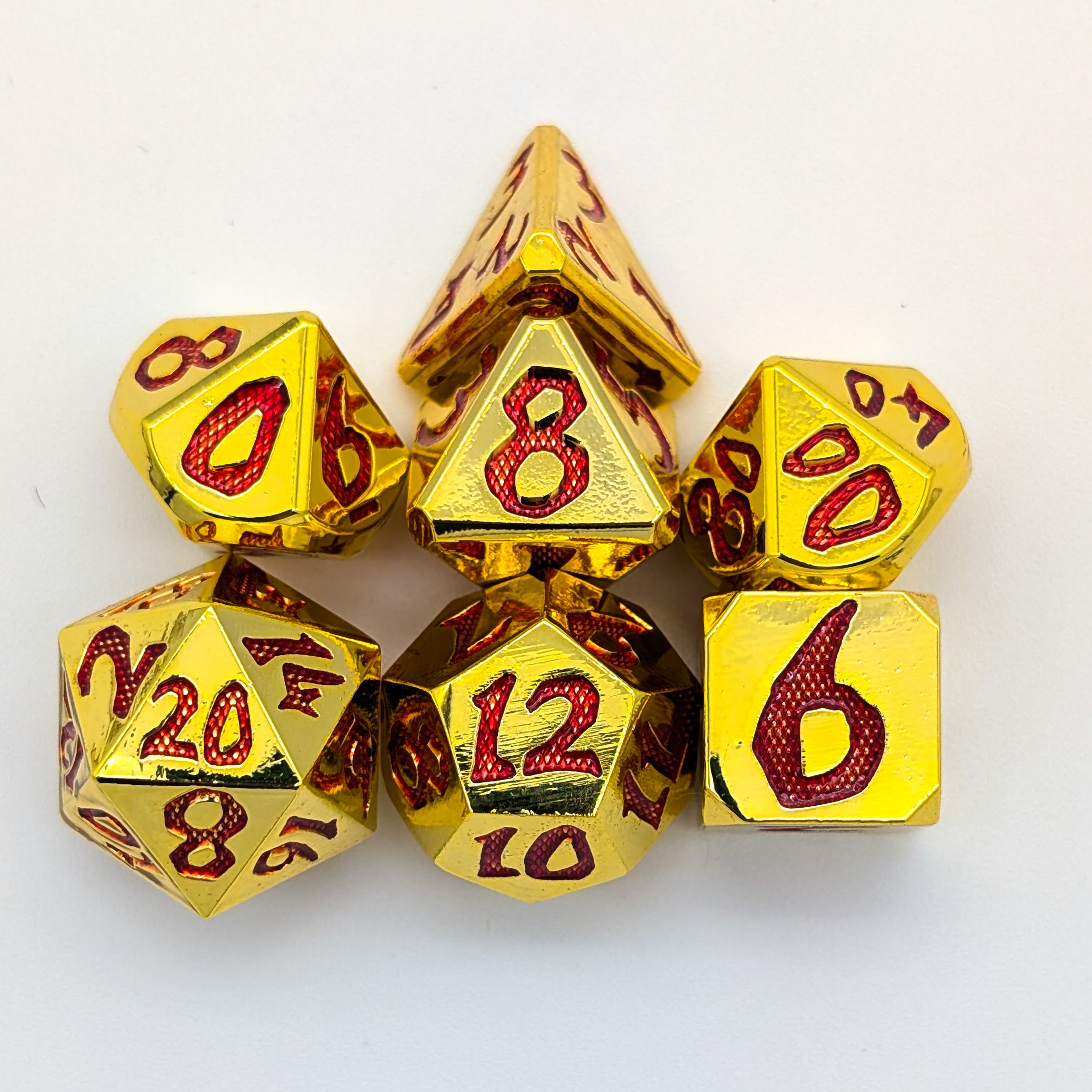 Large Number Gold and Red Metal Core Dice Set