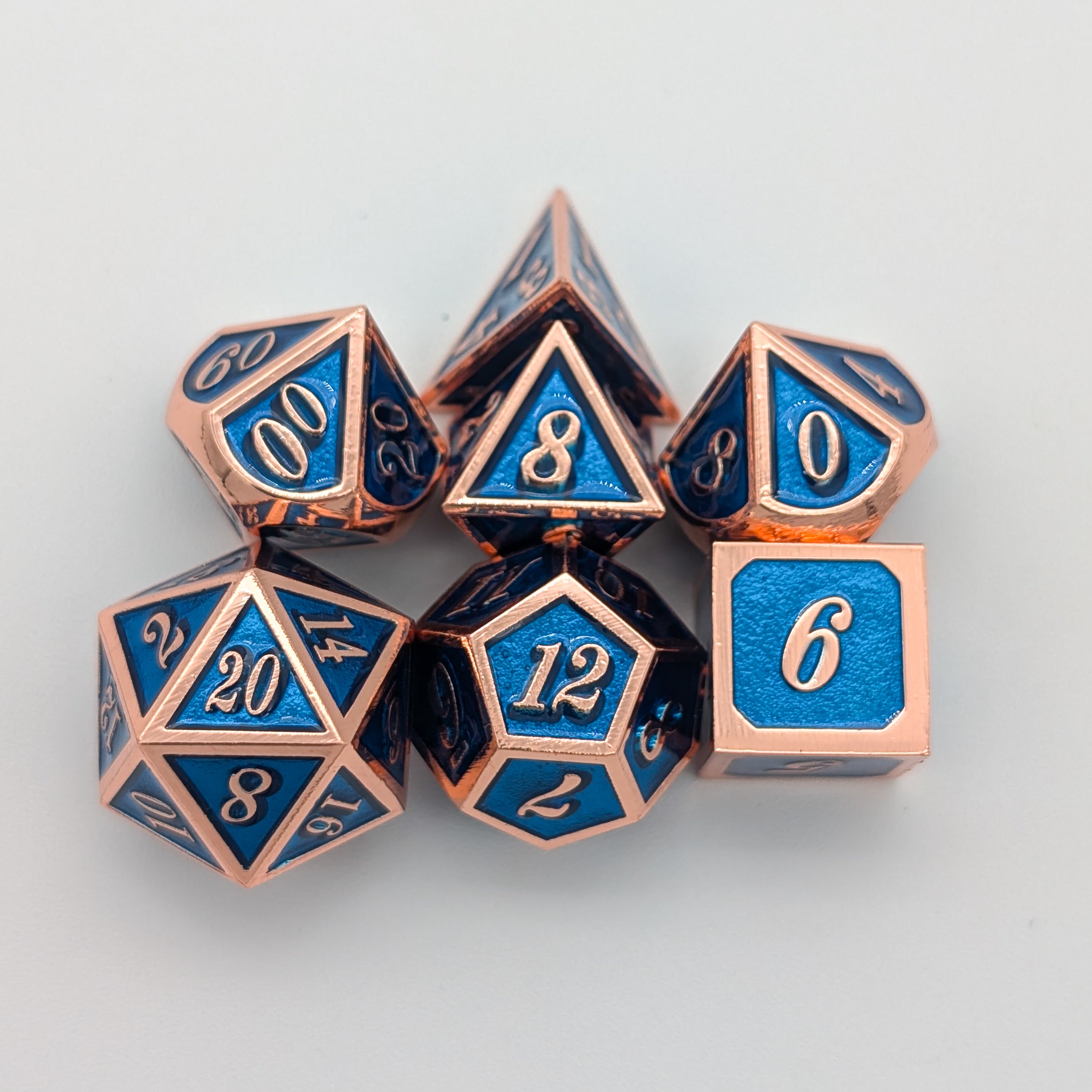 Blue and Rose Gold Metal Dice Set