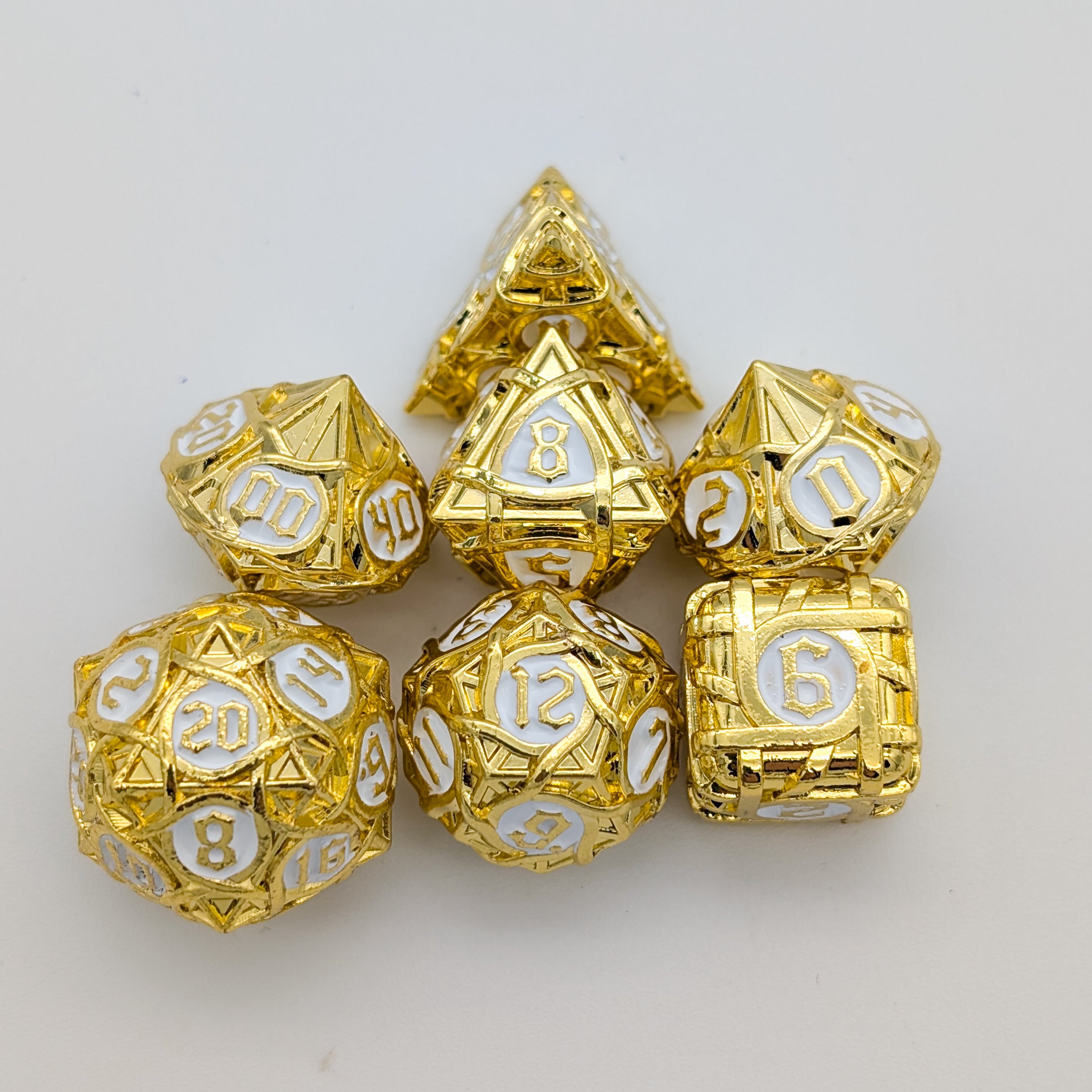 Thorns Gold and White Metal Core Dice Set