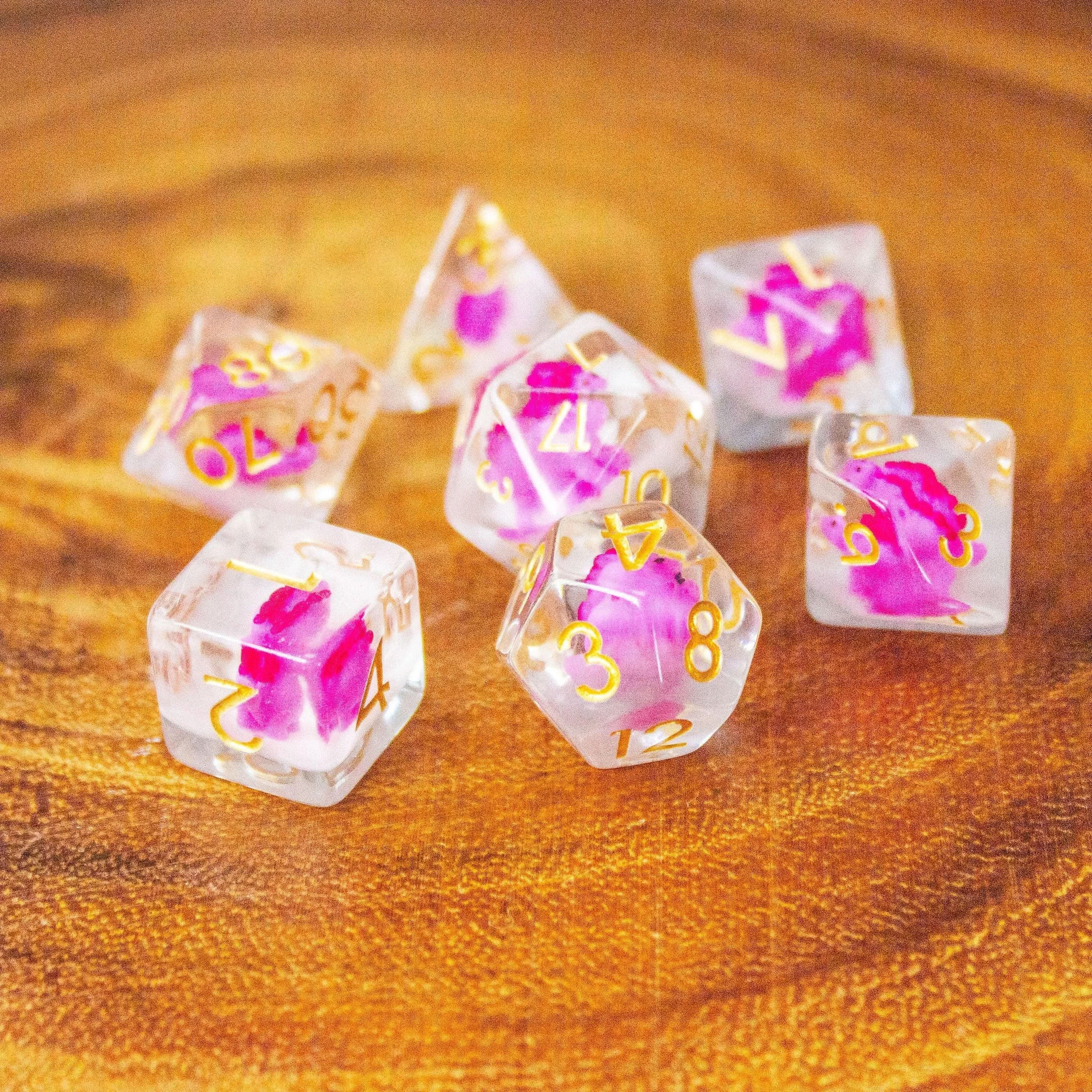 Pink Dinosaurs TTRPG Filled Dice Set| Transparent See through Dice (7) | Polyhedral Dice - MysteryDiceGoblins