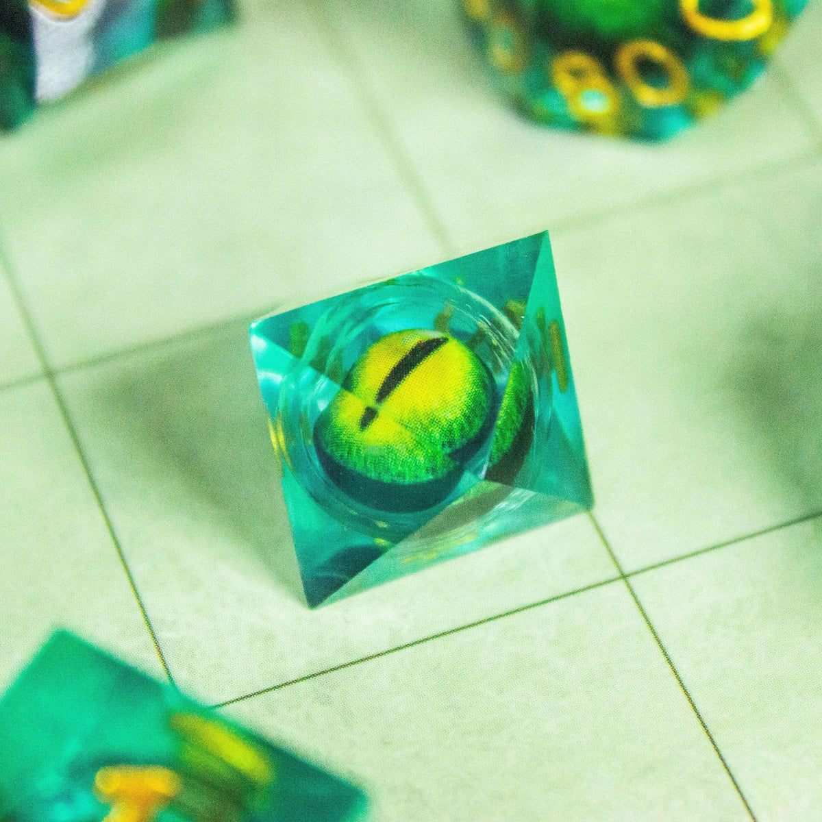 Liquid Core Moving Green Snake Eye TTRPG Dice. Sharp Edged Dice TTRPG - MysteryDiceGoblins