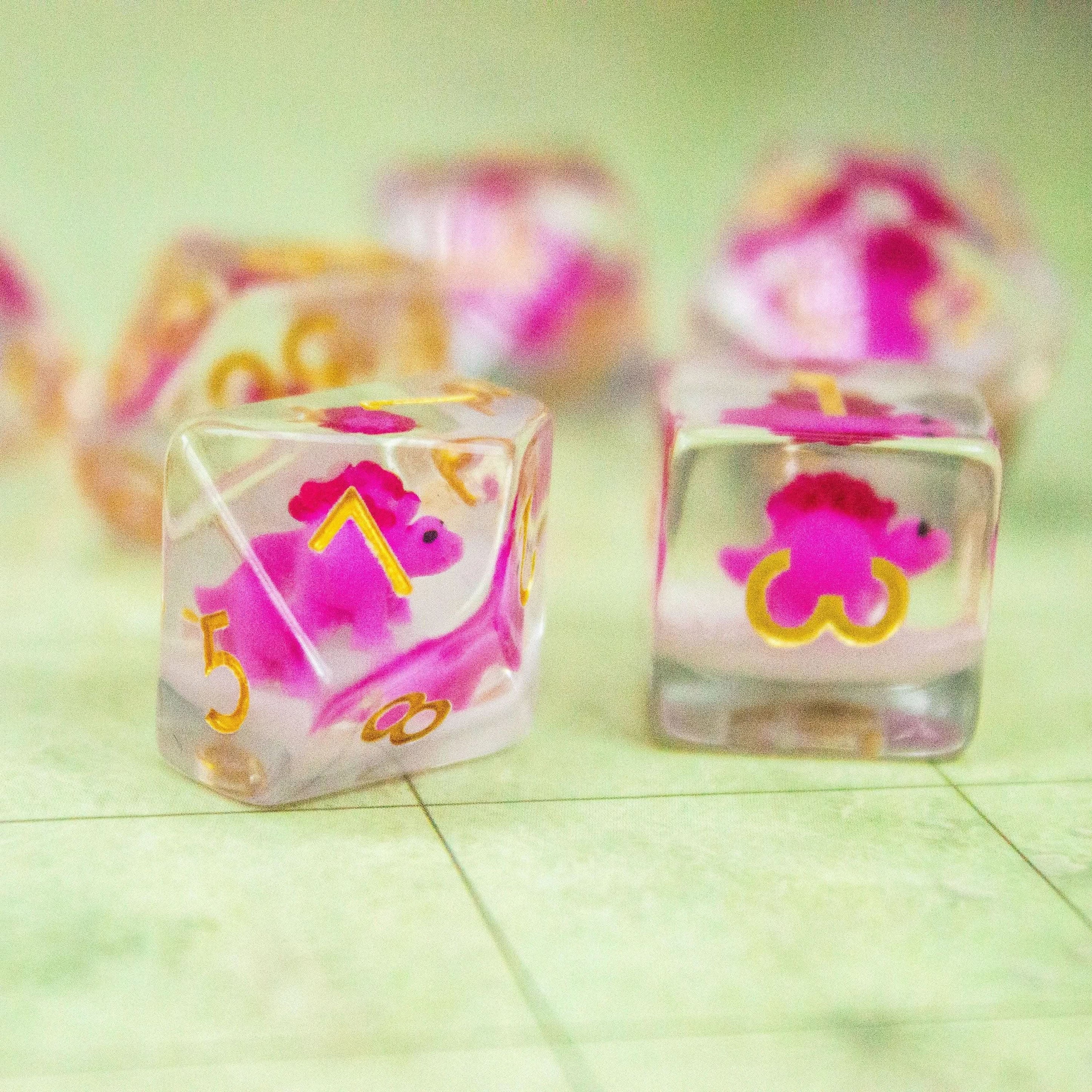 Pink Dinosaurs TTRPG Filled Dice Set| Transparent See through Dice (7) | Polyhedral Dice - MysteryDiceGoblins