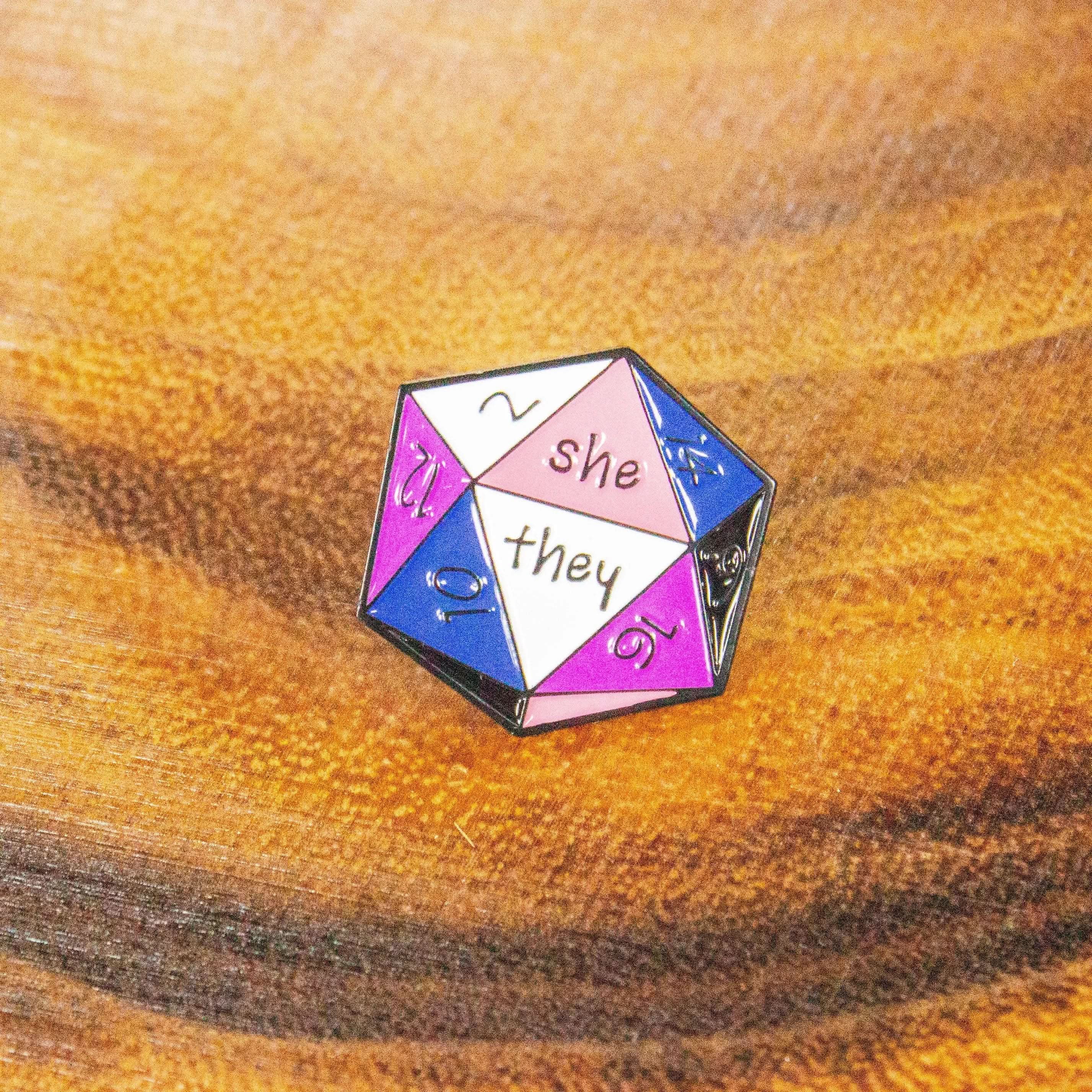 TTRPG She/They Enamel Pronoun Pin, D20 Black White Pink Purple non-binary he they pronoun badge pride - MysteryDiceGoblins