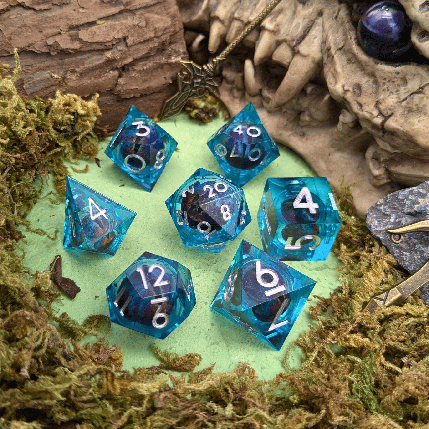 Light Blue Snake Eye Liquid Core Dice Set