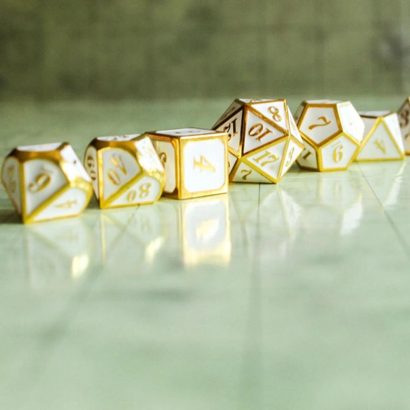 White and Gold Metal Dice Set | TTRPG Dice | White metal dice with Gold Writing - MysteryDiceGoblins