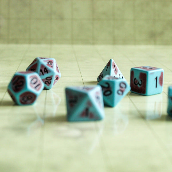 Blue Red Dice set on a Dungeons and Dragons playing mat - MysteryDiceGoblins