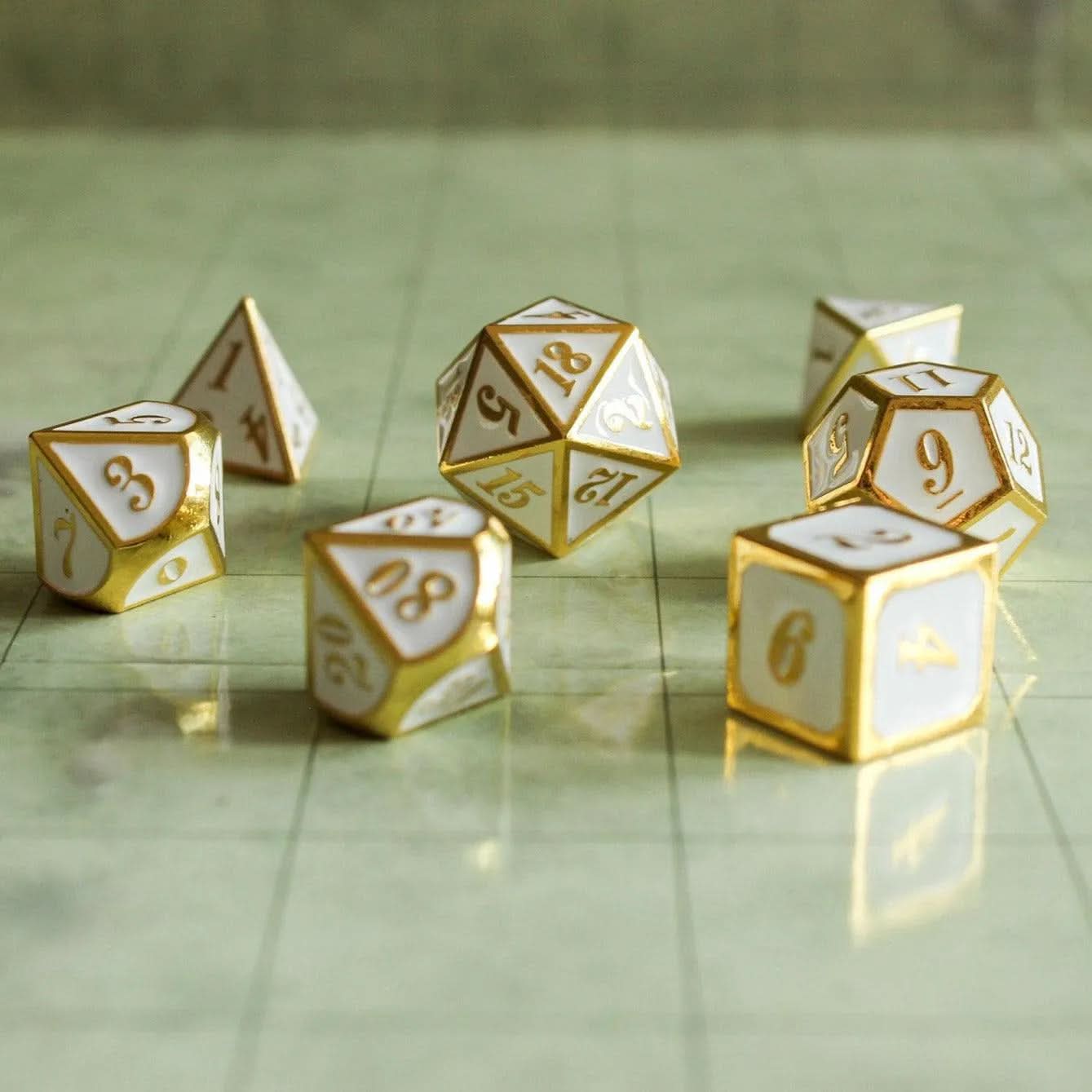 White and Gold Metal Dice Set | TTRPG Dice | White metal dice with Gold Writing - MysteryDiceGoblins