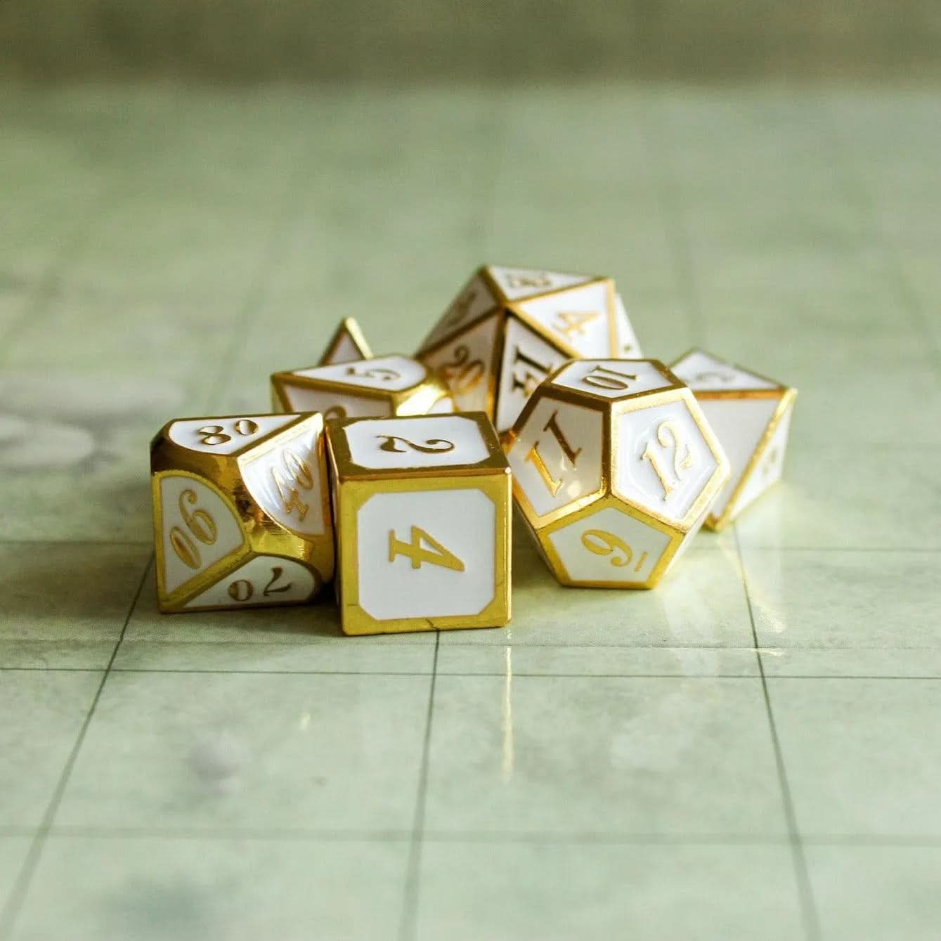 White and Gold Metal Dice Set | TTRPG Dice | White metal dice with Gold Writing - MysteryDiceGoblins