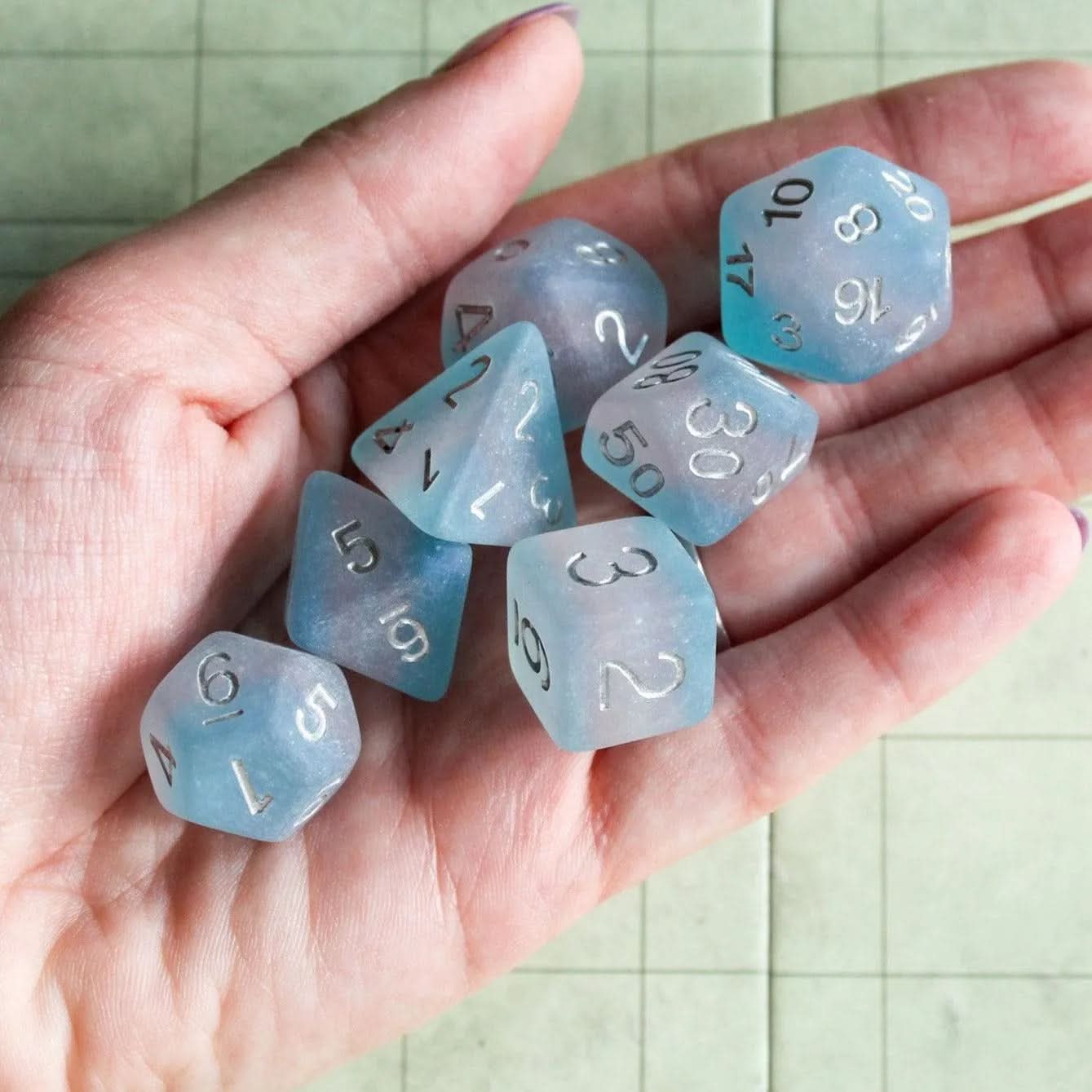 Trans Flag Dice, celebrate diversity and roll with style with these stunning multicoloured transgender polyhedral dice - MysteryDiceGoblins
