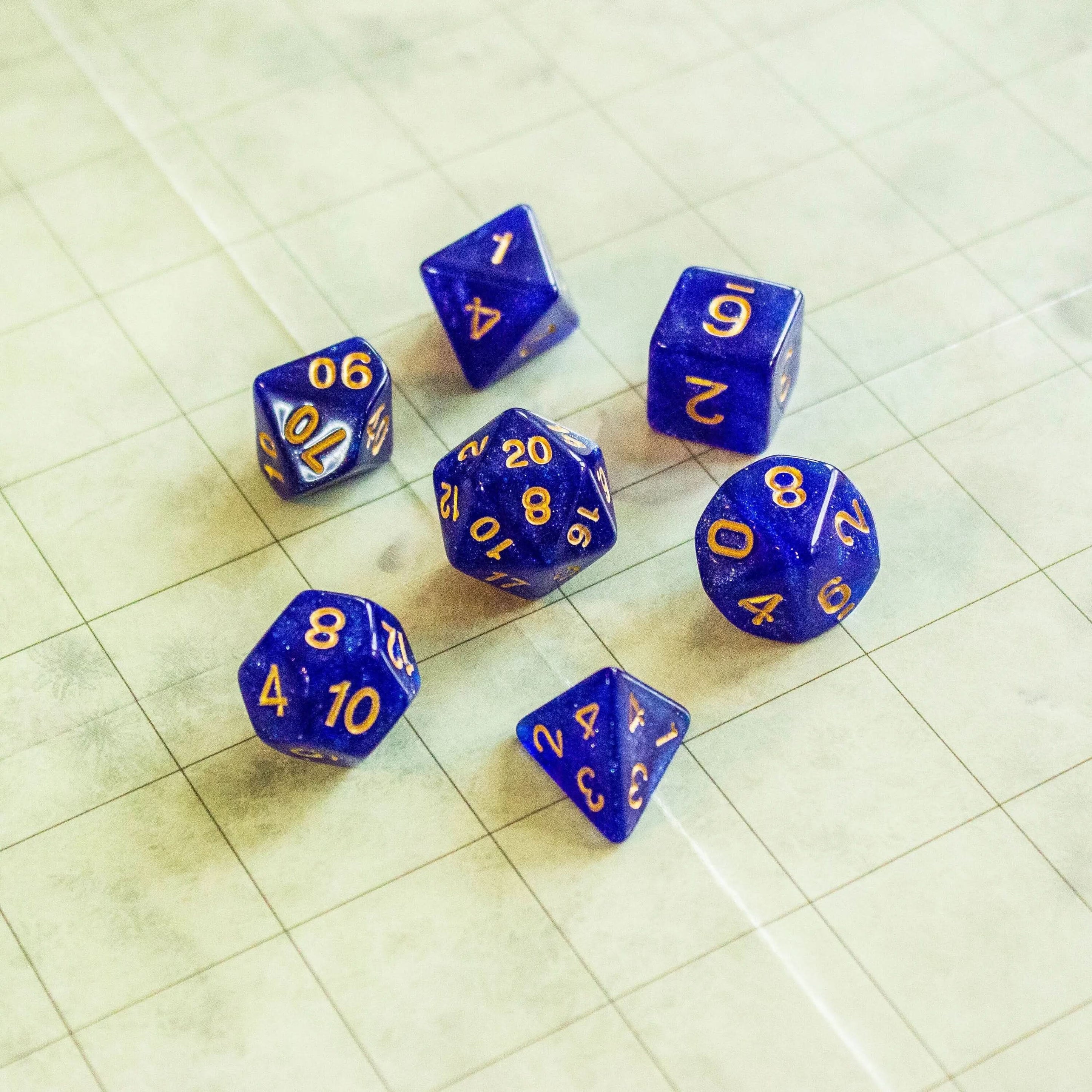 Deep Blue Shimmer Dice With Gold Nunbers TTRPG Dice, roll with sophistication with these blue polyhedral dice - MysteryDiceGoblins