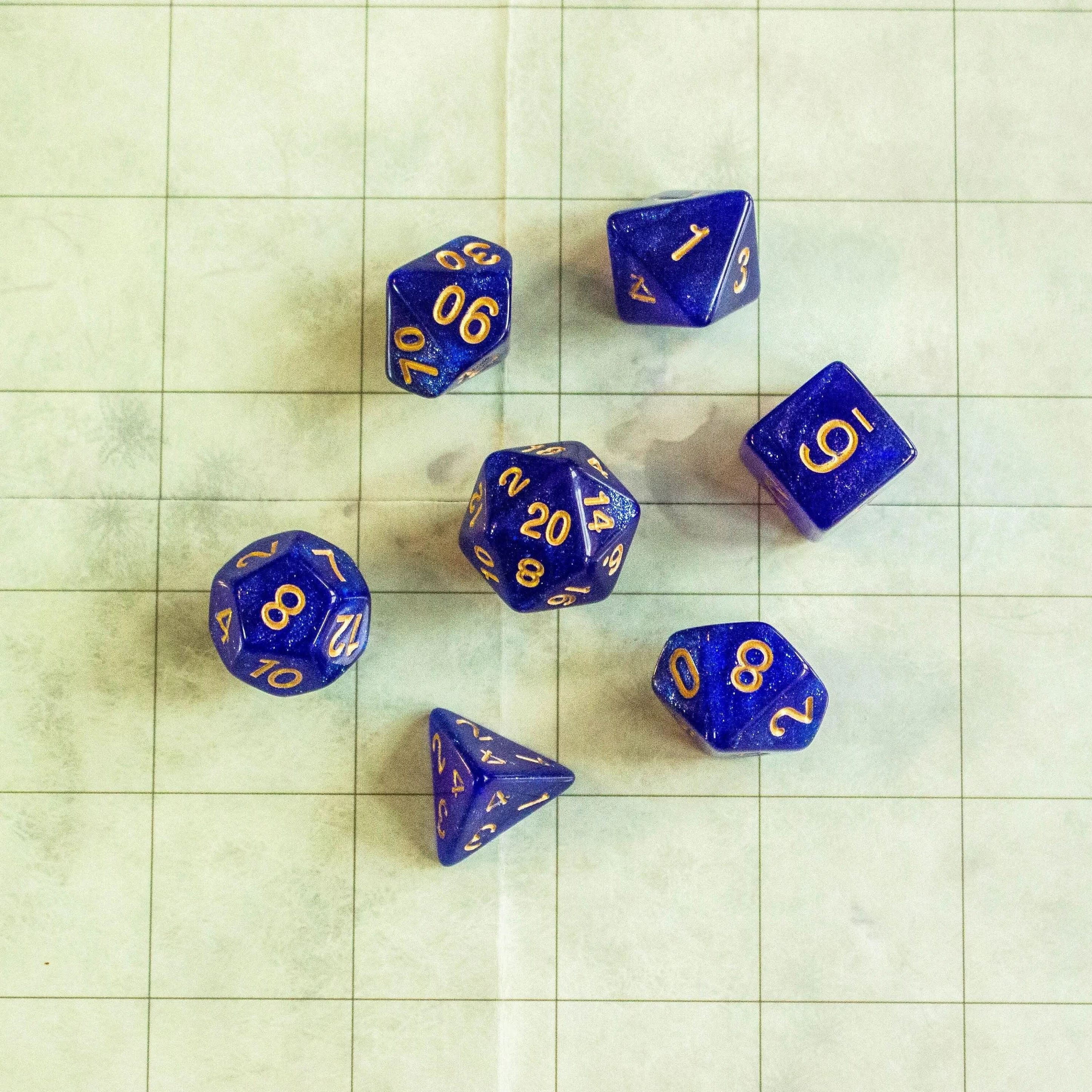 Deep Blue Shimmer Dice With Gold Nunbers TTRPG Dice, roll with sophistication with these blue polyhedral dice - MysteryDiceGoblins