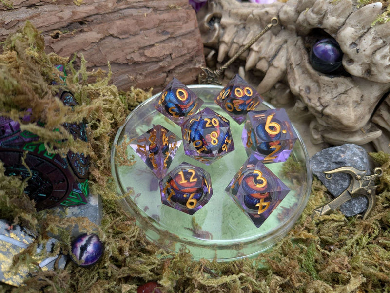 Dragon Eye Purple and Orange Liquid Core Dice Set