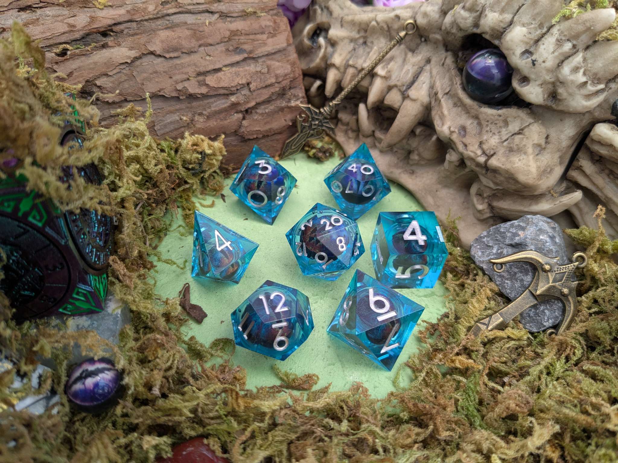 Light Blue Snake Eye Liquid Core Dice Set