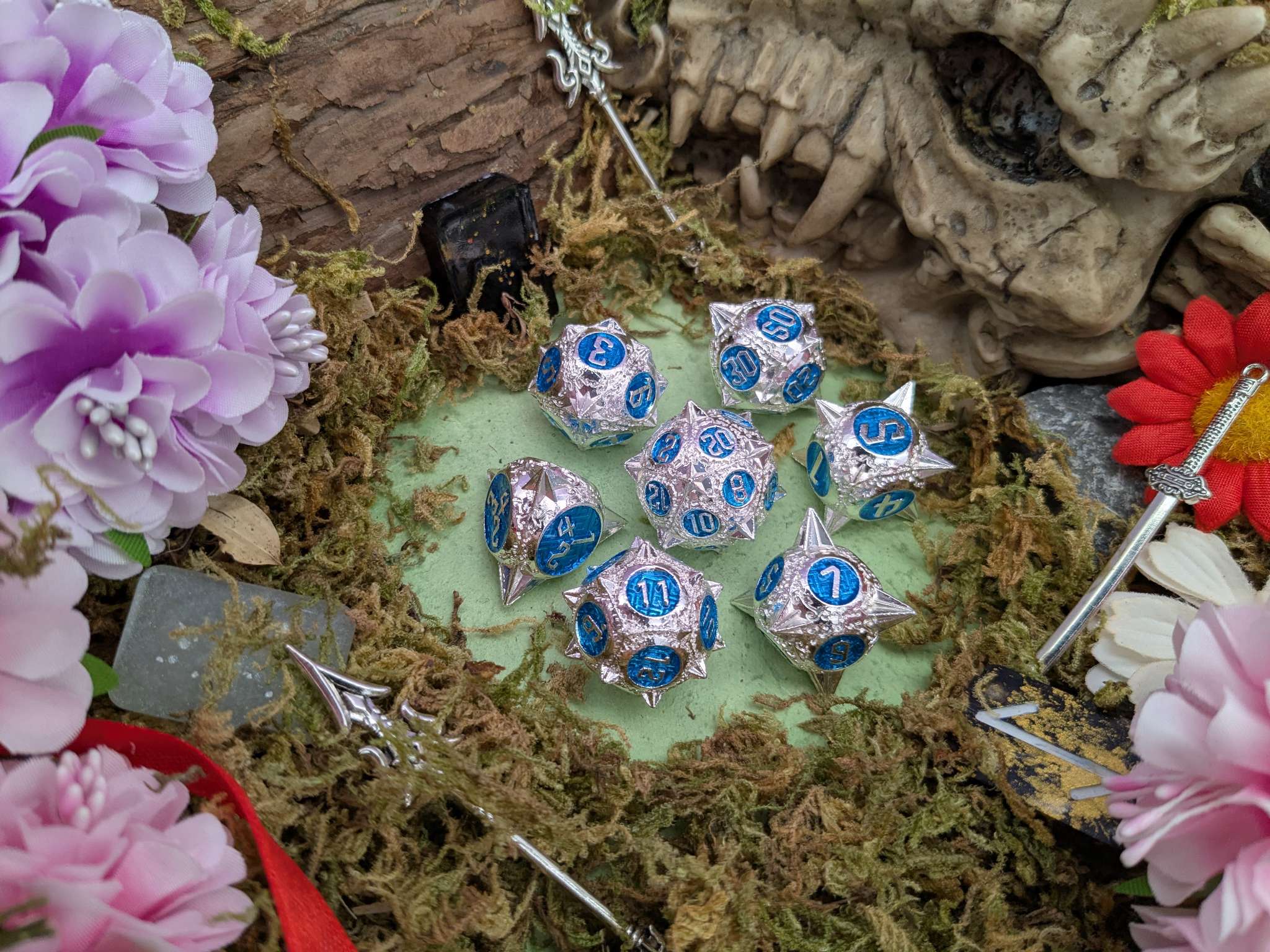 Caltrops Silver and Blue Metal Core Dice Set