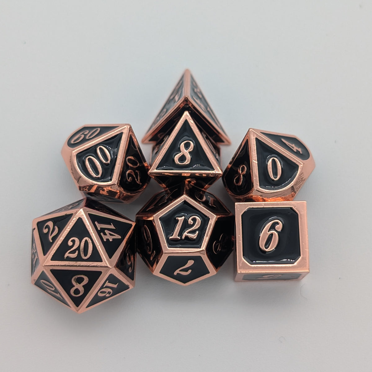 Simple Black and Copper Metal Core Dice Set