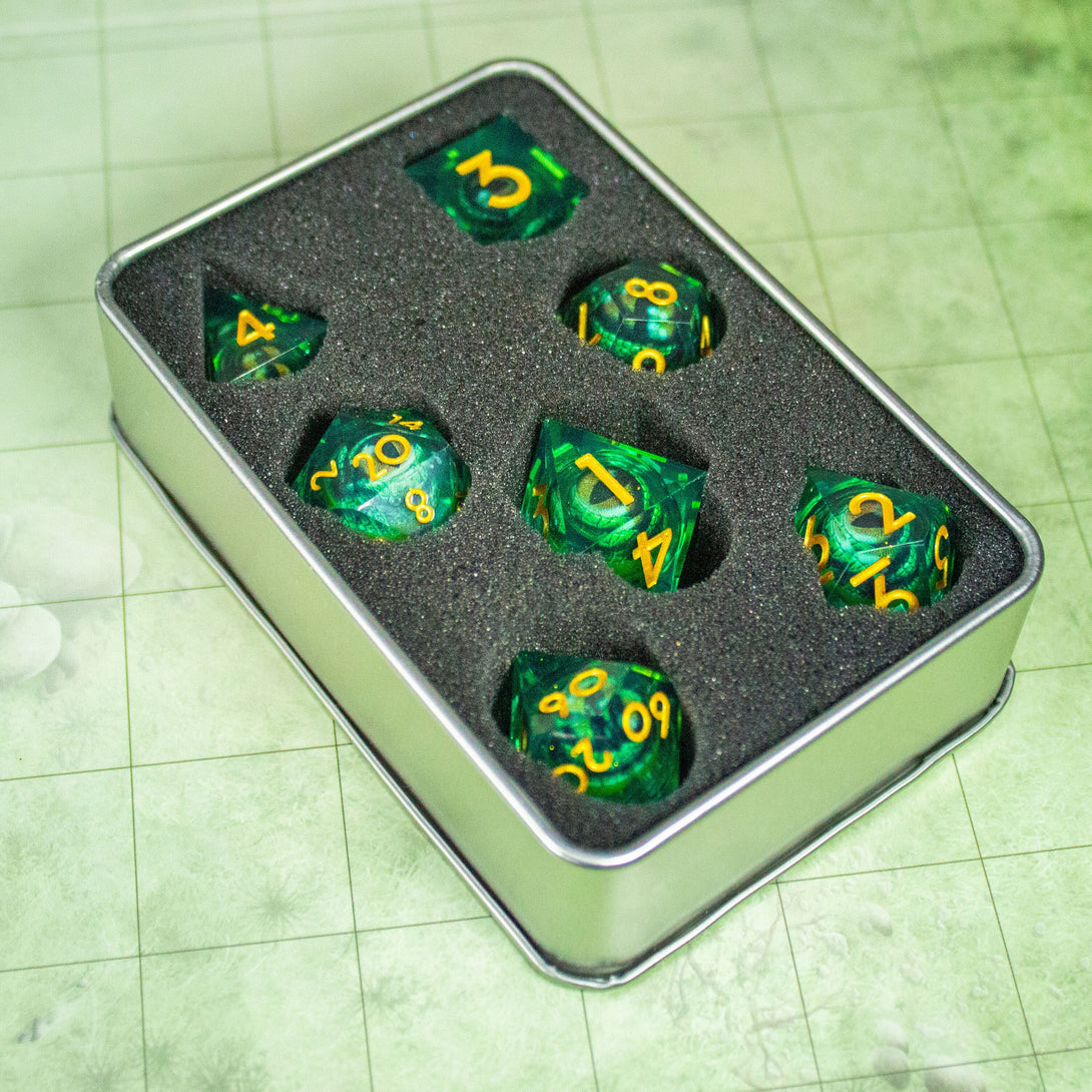 Liquid Core Moving Green Dragon Eye DnD Dice. Where precision and style meet. Perfect for any sorcerers spell - MysteryDiceGoblins