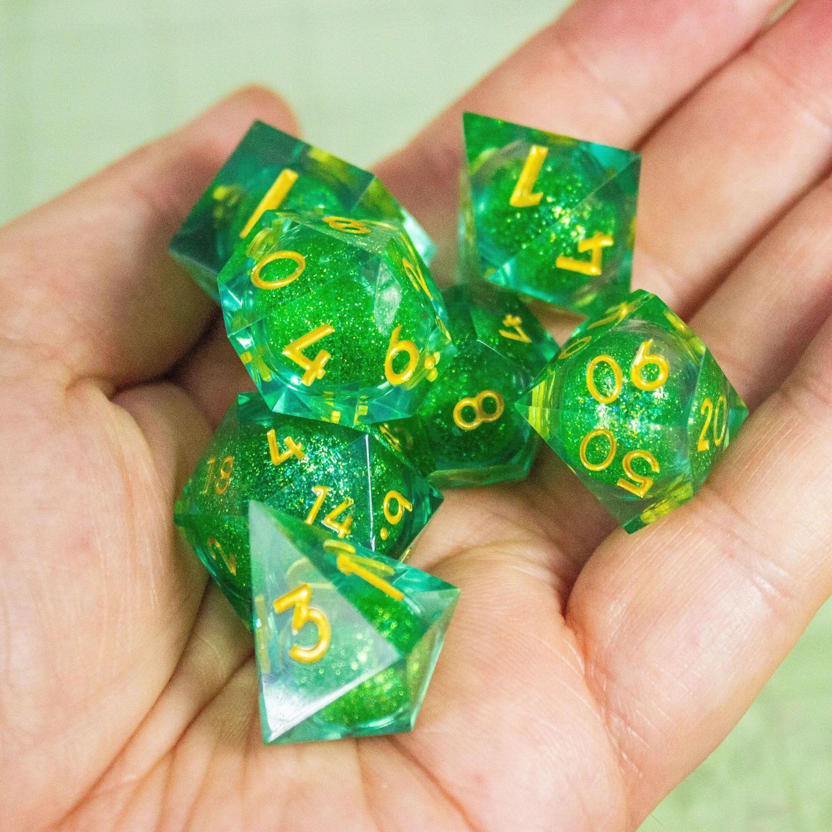 Green Shimmer Liquid Core Sharp Edge TTRPG  Dice    Gold Writing Premium Dice - MysteryDiceGoblins