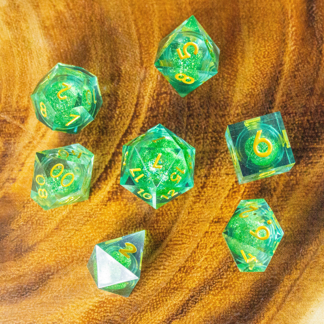 Green Shimmer Liquid Core Sharp Edge DnD Dice Dungeons and Dragons Gold Writing Premium Dice - MysteryDiceGoblins