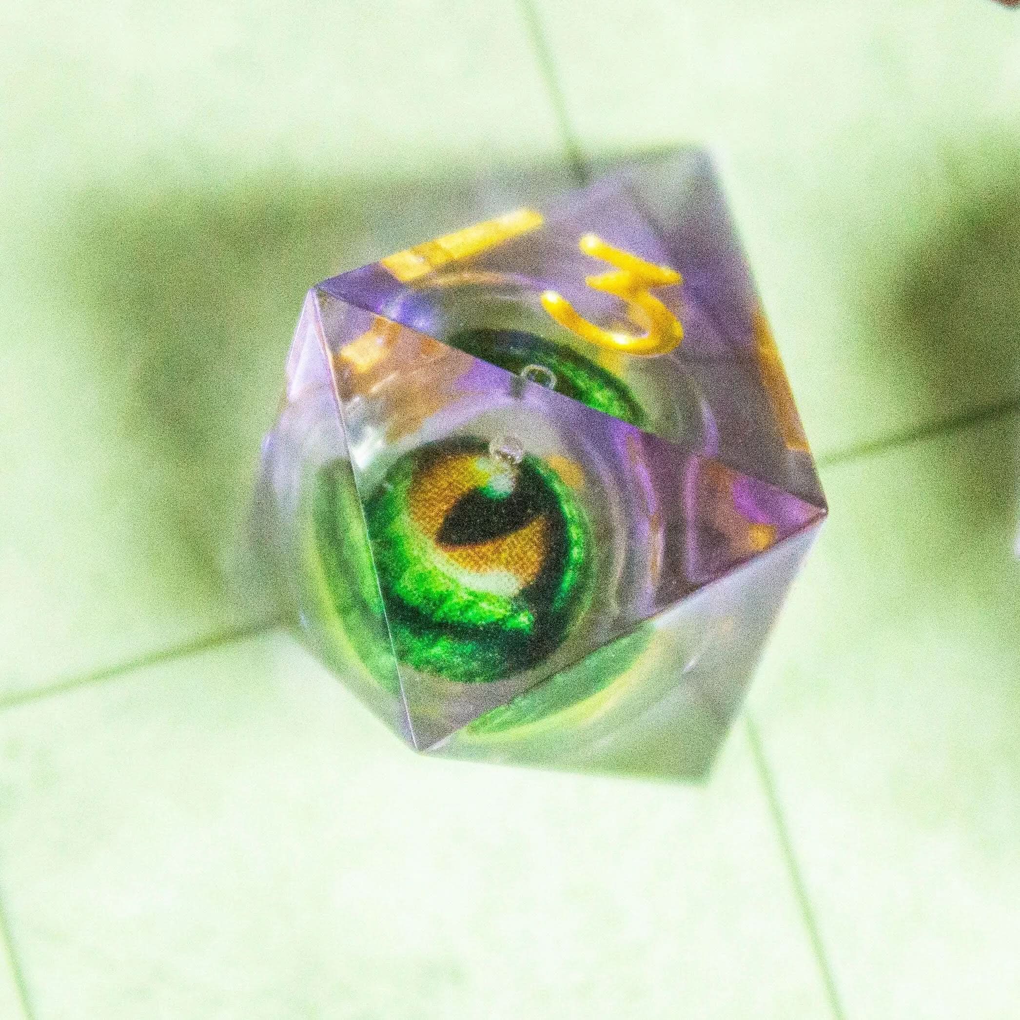 Liquid Core Moving Purple Dragon Eye TTRPG  Dice. Sharp Edged Dice    TTRPG  - MysteryDiceGoblins