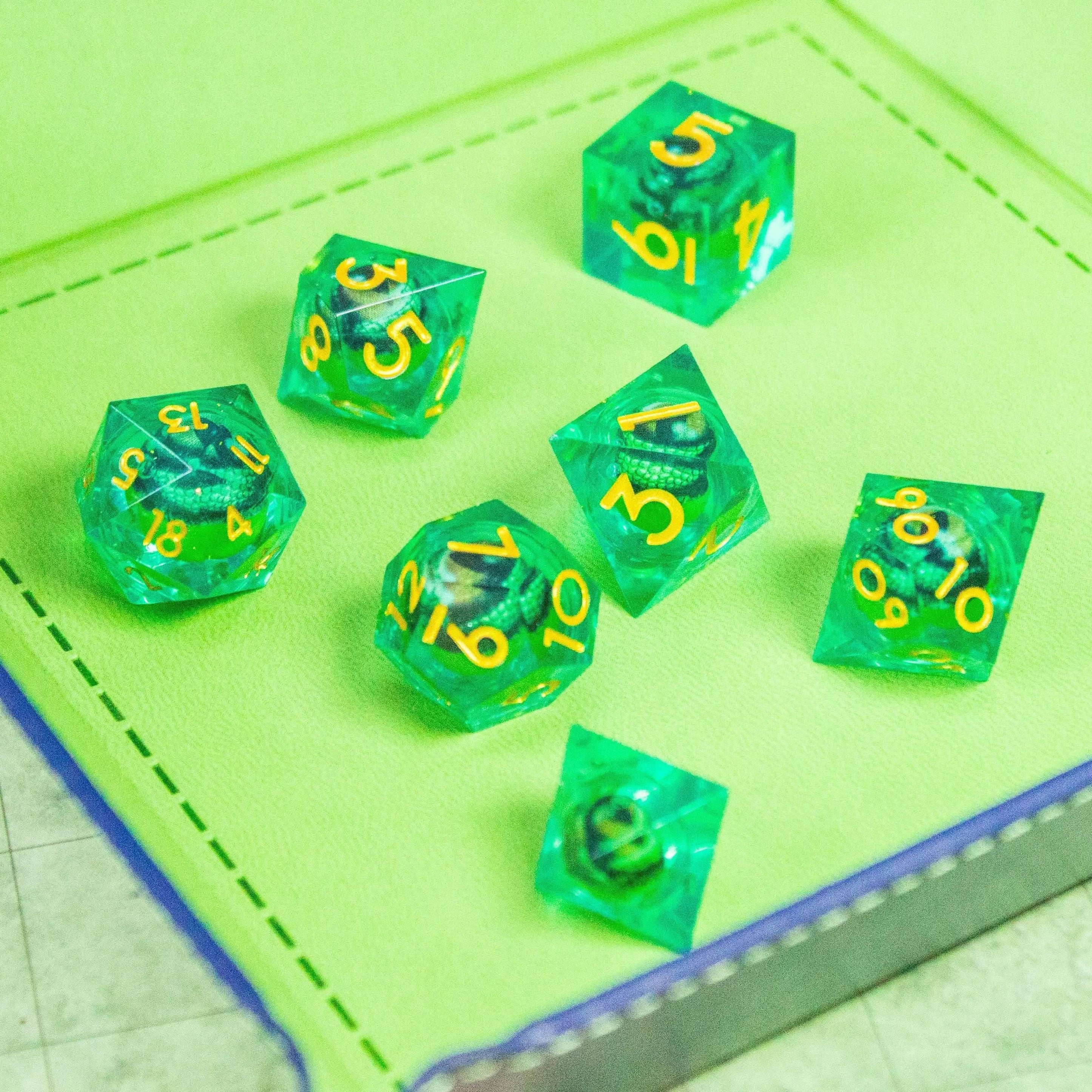 Liquid Core Moving Green Dragon Eye TTRPG  Dice. Where precision and style meet. Perfect for any sorcerers spell - MysteryDiceGoblins