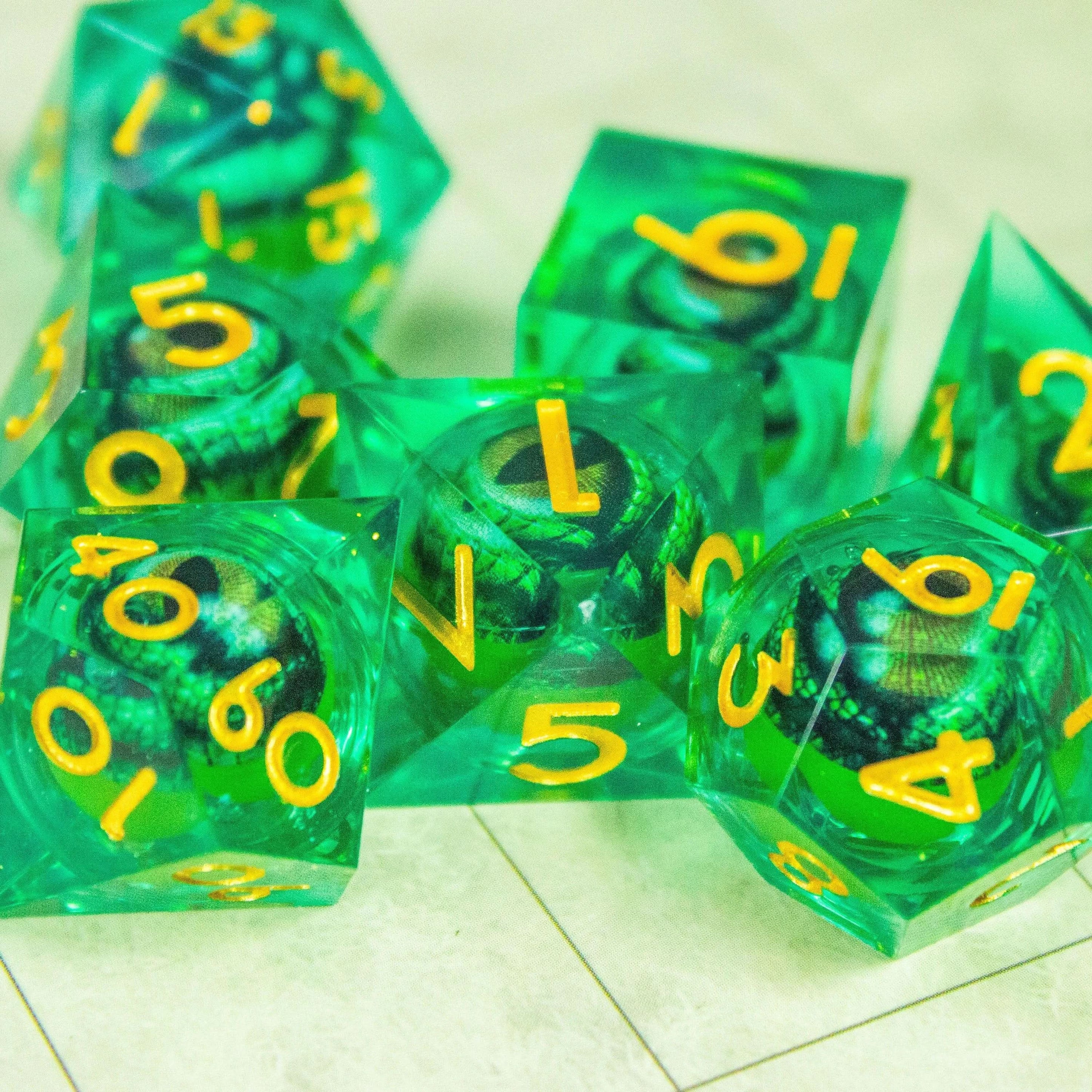 Liquid Core Moving Green Dragon Eye TTRPG  Dice. Where precision and style meet. Perfect for any sorcerers spell - MysteryDiceGoblins