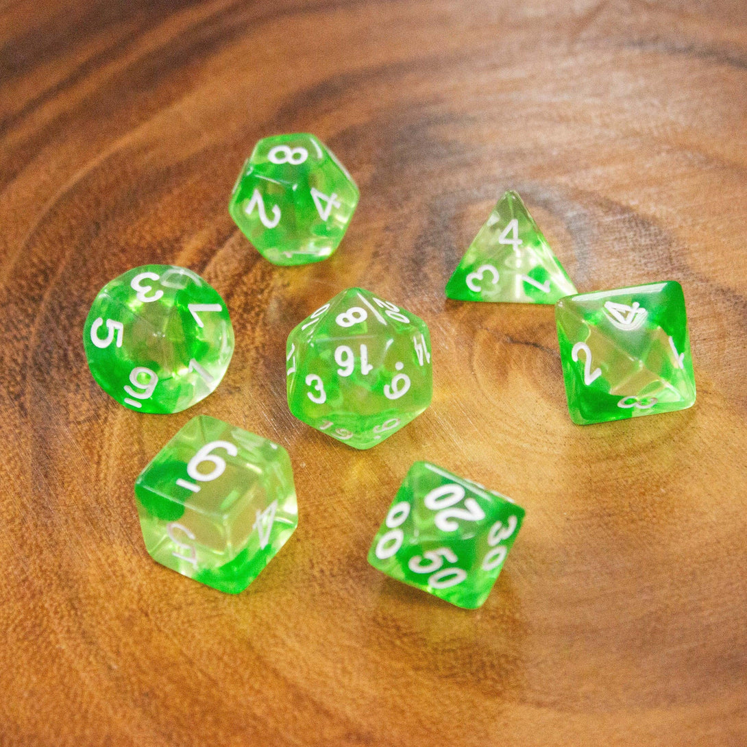 Green Swish DnD Dice. Dive into enchanting adventures with these captivating, green, earthy dice. Easy-to-read white numbering - MysteryDiceGoblins