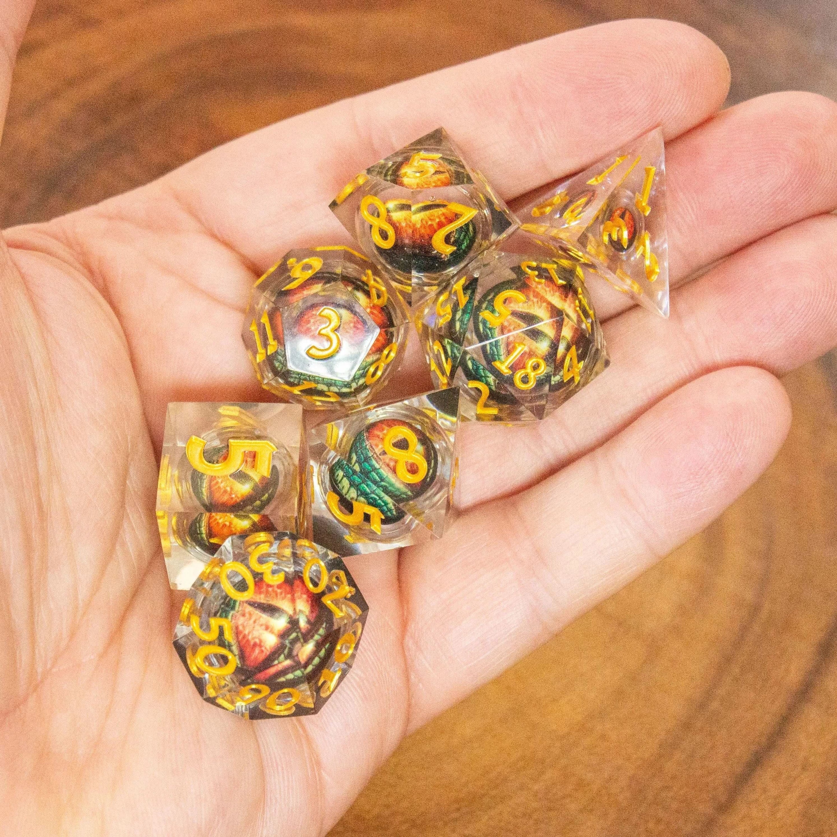 Liquid Core Moving Oragne Dragon Eye TTRPG  Dice. Sharp Edged Dice    TTRPG  - MysteryDiceGoblins