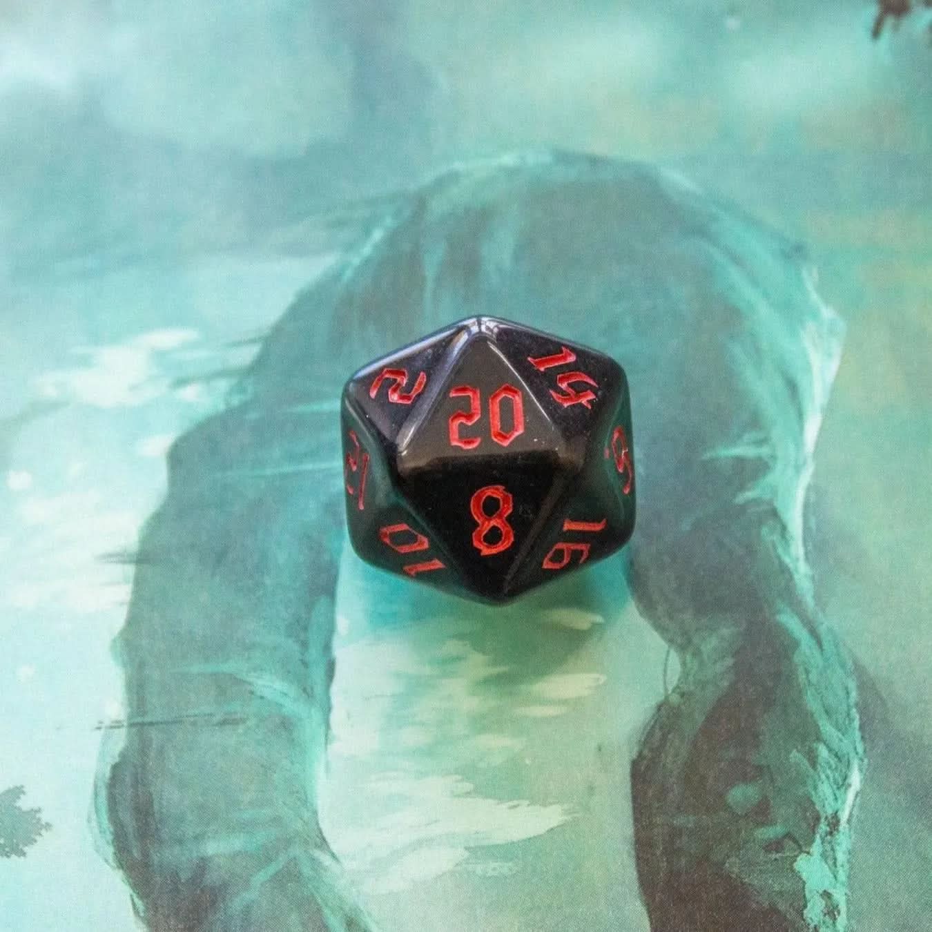 a dice showing the number 20 on a green backfround - Mystery Dice Goblin
