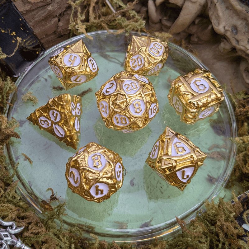 Thorns Gold and White Metal Core Dice Set