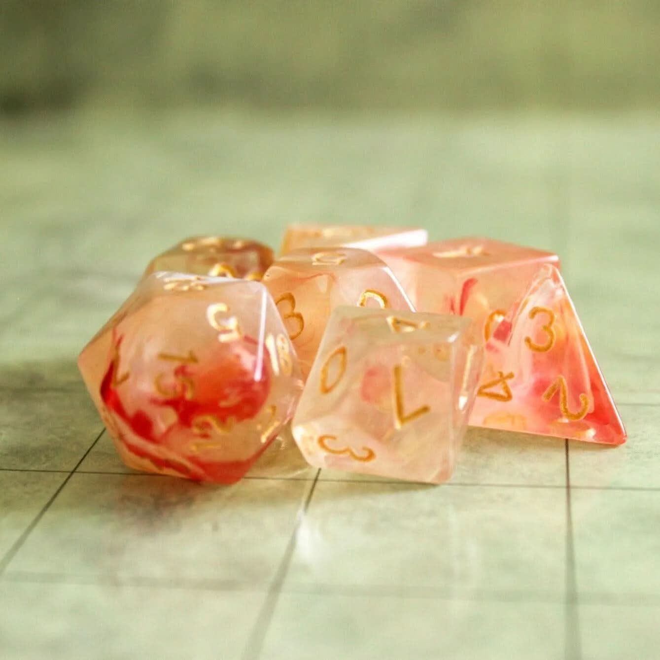 Peach Swirl Dice Set | Red and Pink Dice for TTRPG  |    Dice Gold Writing (7) | Polyhedral White Dice