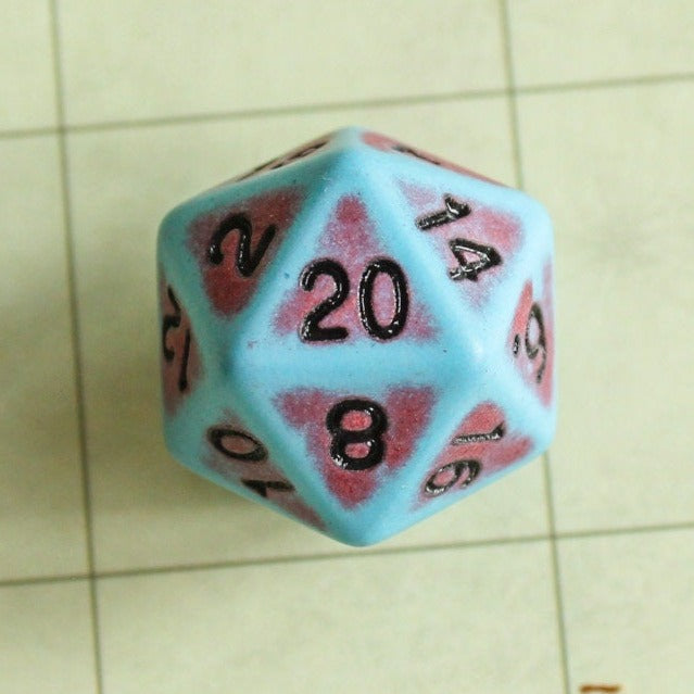 Single Blue Red D20 on a dnd mat, with the 20 facing upwards - MysteryDiceGoblins
