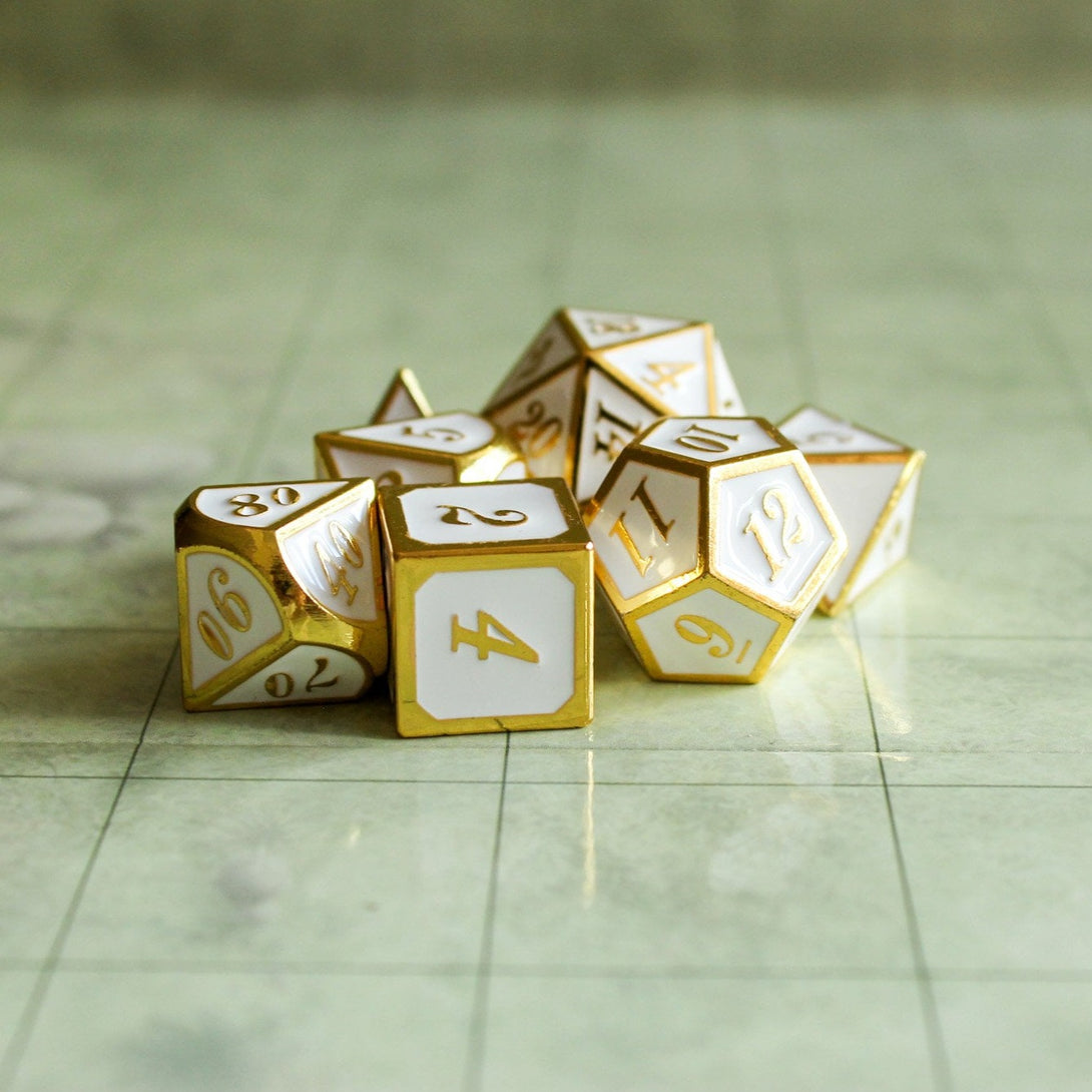 White and Gold Metal Dice Set | Dungeons and Dragons DnD Dice | White metal dice with Gold Writing - MysteryDiceGoblins