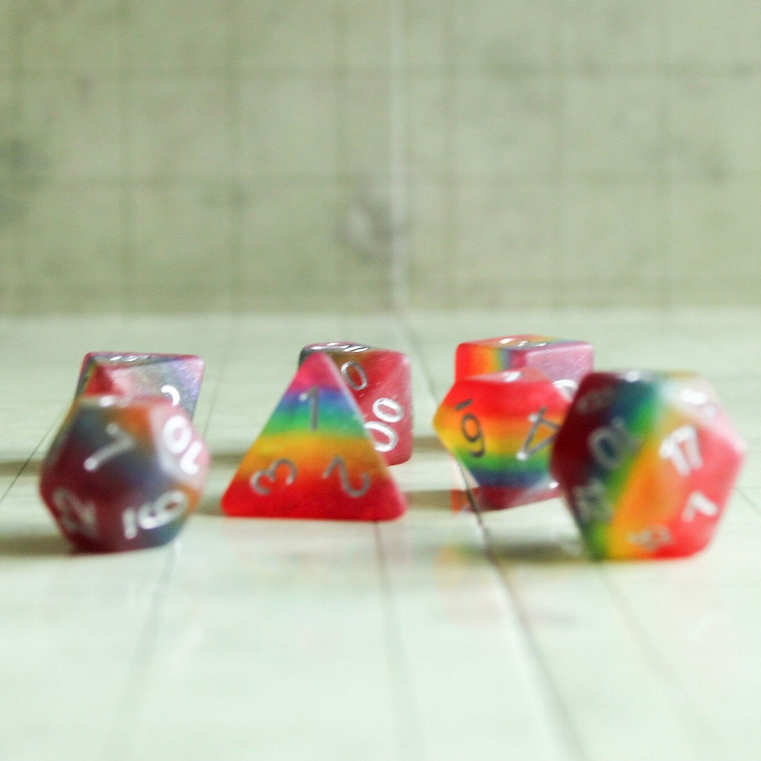 Pride Flag Dice, celebrate diversity and roll with style with these stunning multicoloured Pride LGBTQ+ polyhedral dice - MysteryDiceGoblins