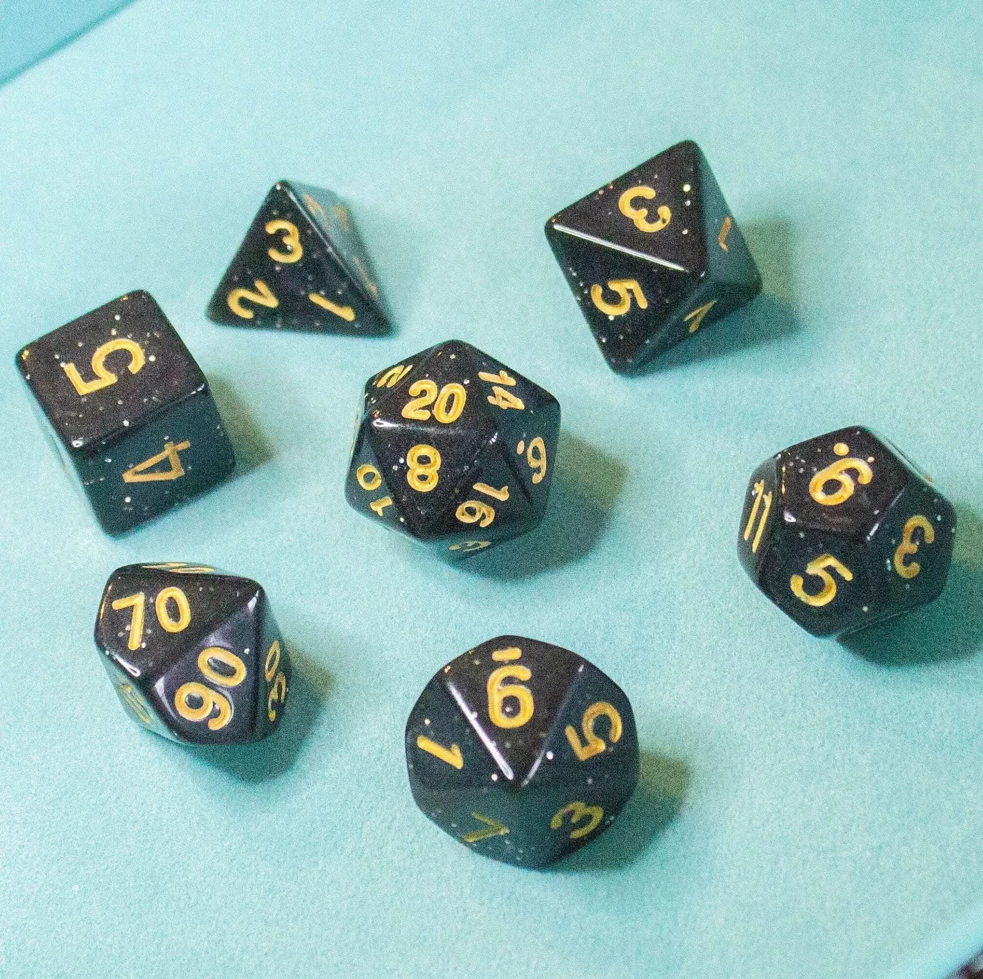 Black Shimmer Dice With Gold Nunbers TTRPG  Dice, roll with sophistication with these black polyhedral dice - MysteryDiceGoblins