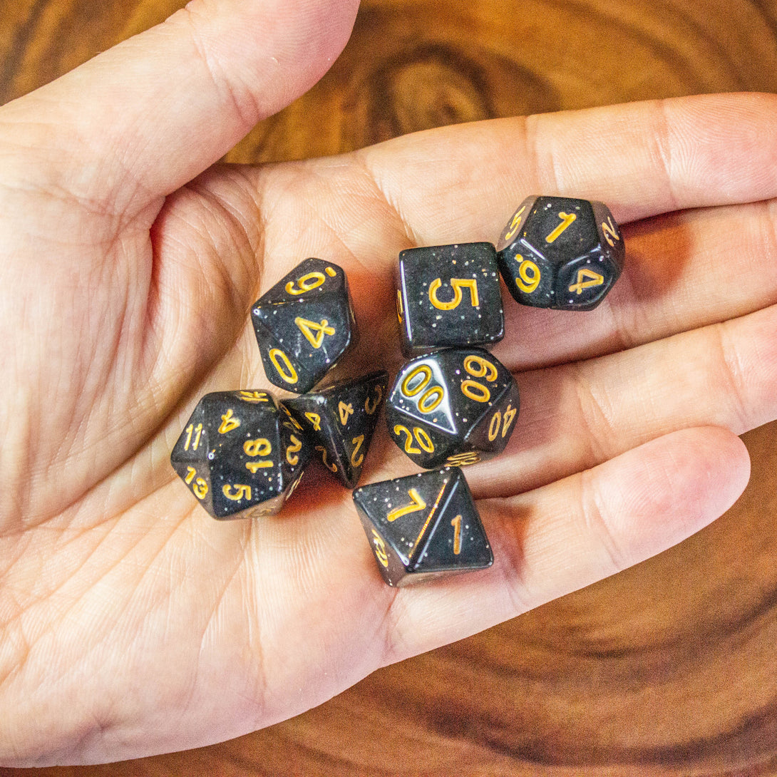 Black Shimmer Dice With Gold Nunbers DnD Dice, roll with sophistication with these black polyhedral dice - MysteryDiceGoblins