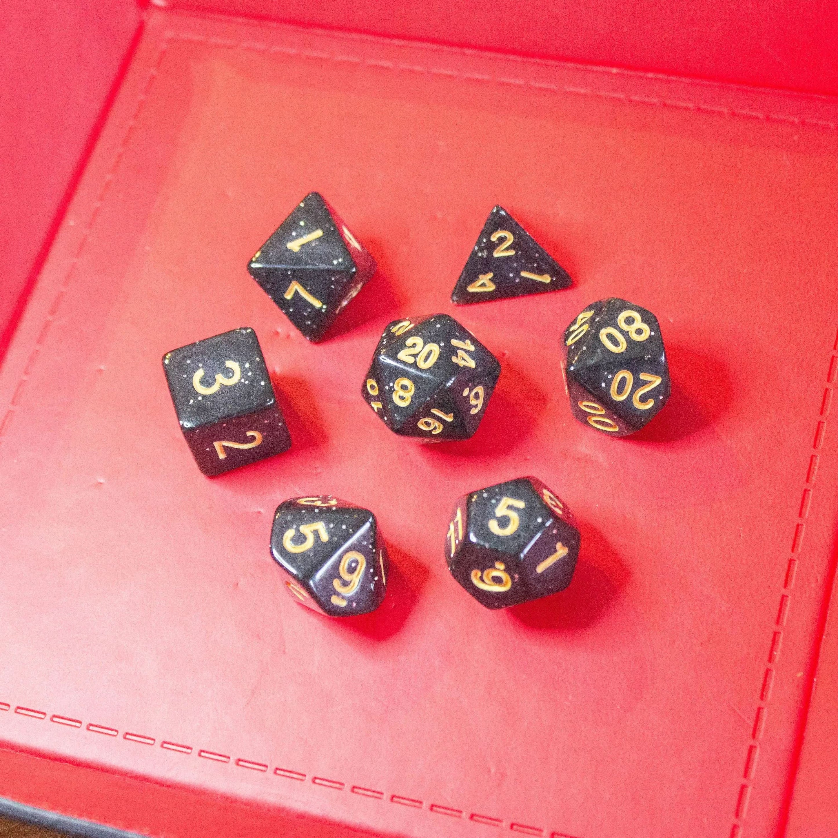 Black Shimmer Dice With Gold Nunbers TTRPG  Dice, roll with sophistication with these black polyhedral dice - MysteryDiceGoblins