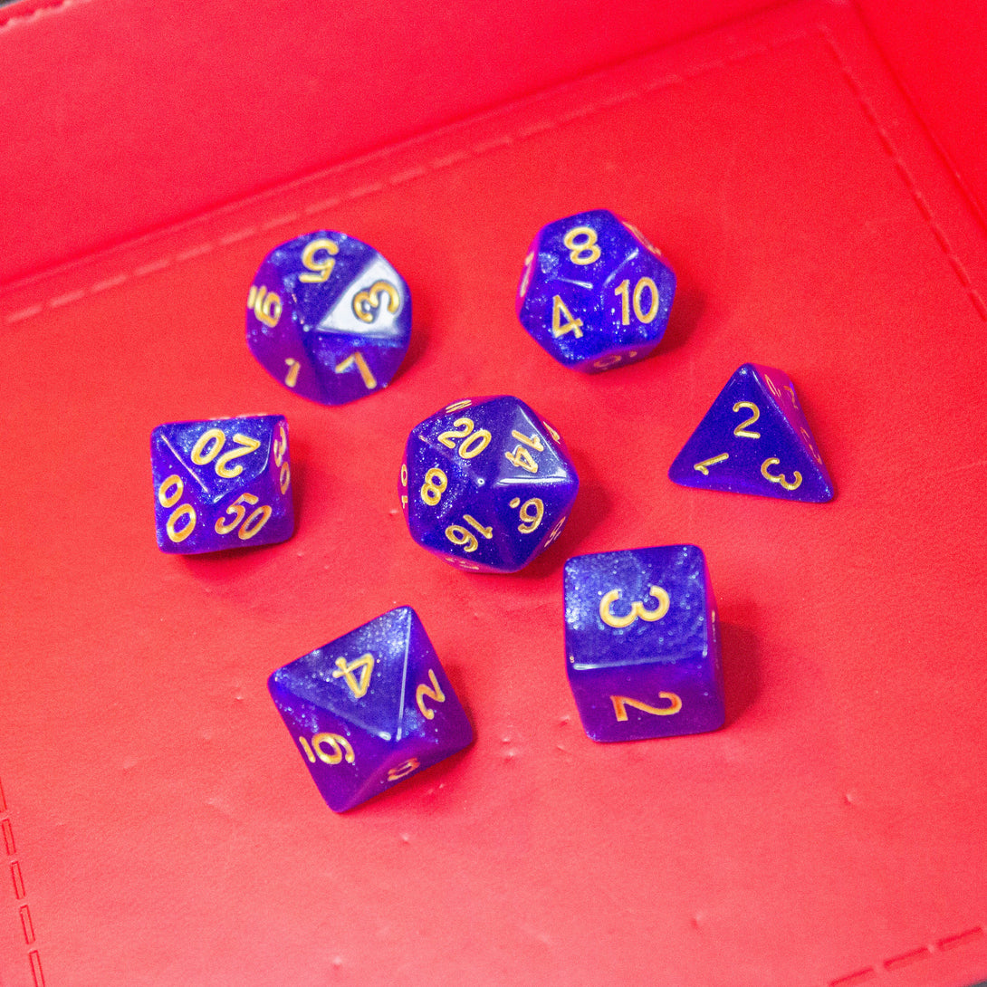 Deep Blue Shimmer Dice With Gold Nunbers DnD Dice, roll with sophistication with these blue polyhedral dice - MysteryDiceGoblins