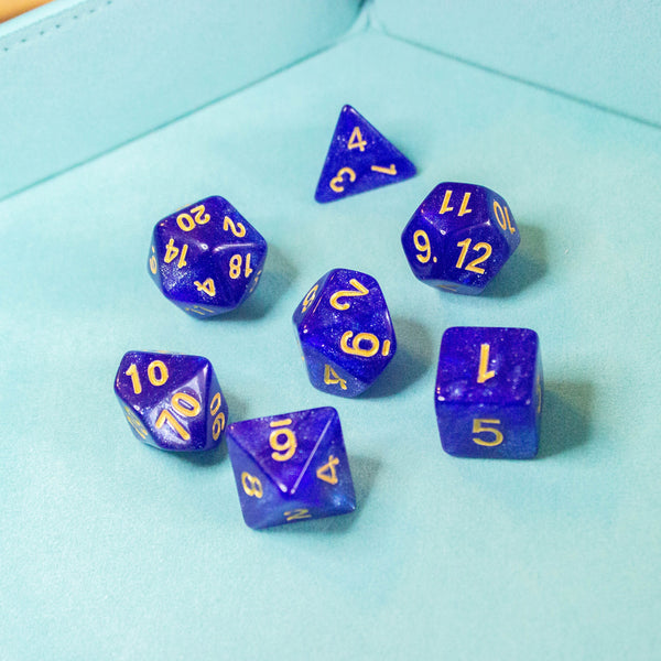 Deep Blue Shimmer Dice With Gold Nunbers DnD Dice, roll with sophistication with these blue polyhedral dice - MysteryDiceGoblins
